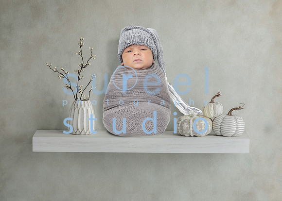 894 5x7 baby on shelf